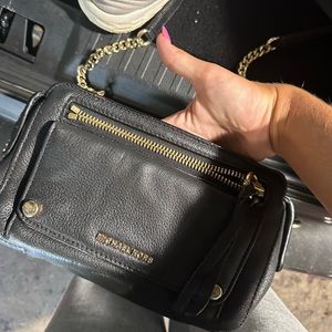 Black with gold chain Michael Kors purse